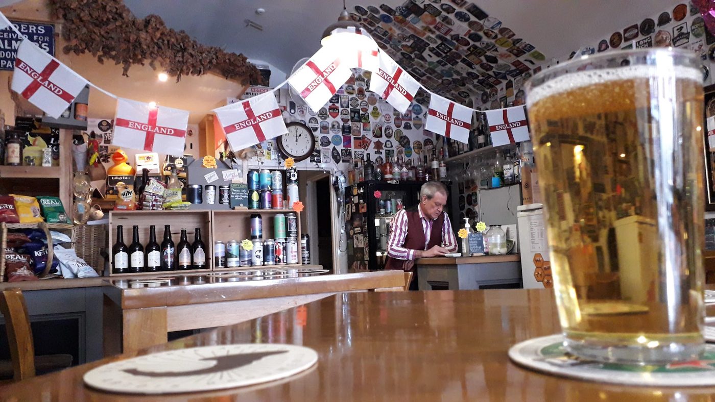 The bar counter with bunting and England flags