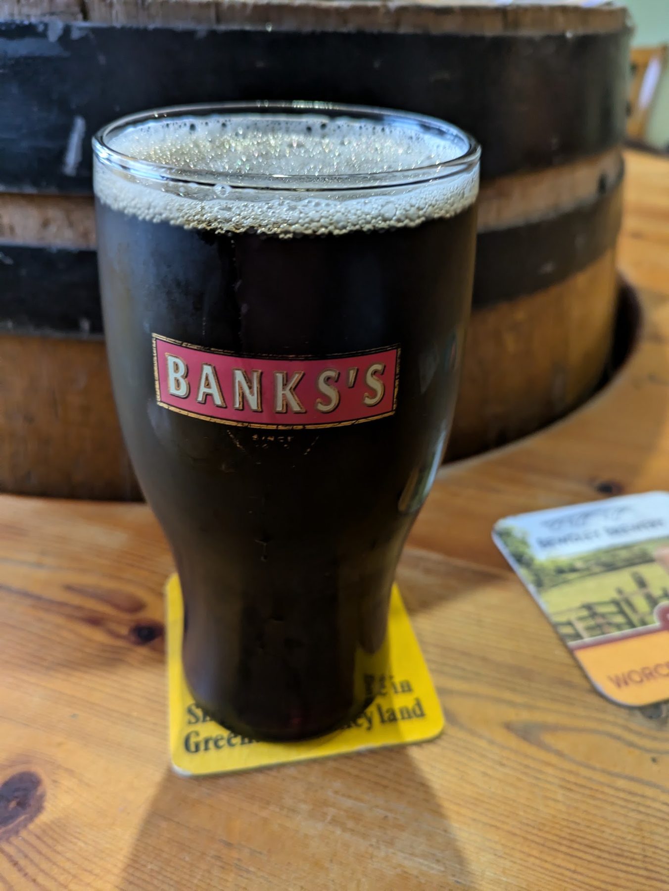 A pint of dark Banks’s ale on a table